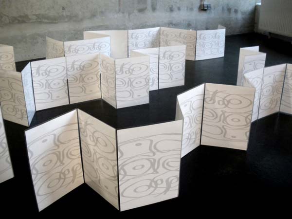 laminated maculatures- arranged patterns of  video feedback patterns (c) Barbara Doser 2010